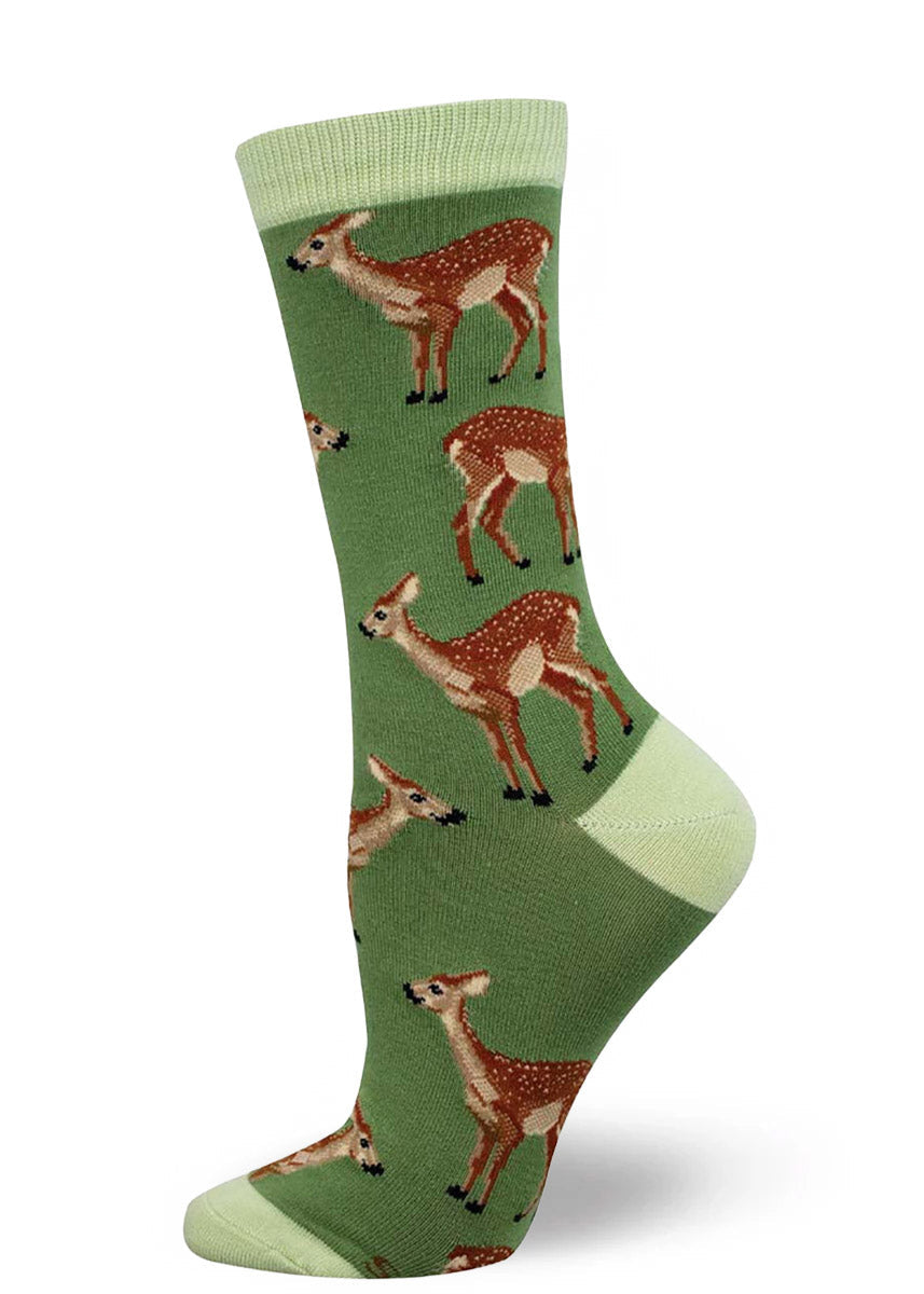 Green crew socks for women with an allover pattern of spotted fawns.